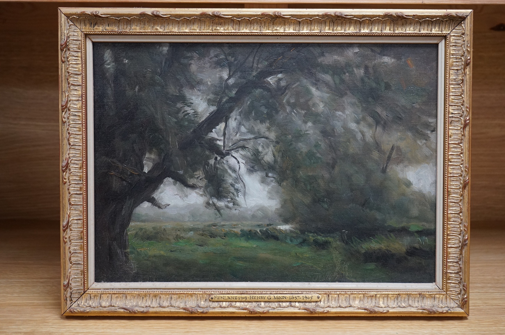 Henry G. Moon (1857-1905), oil on canvas, 'Fenn Lane 1903', signed in ink verso, inscribed plaque to the gilt frame, 24 x 34cm. Condition - good